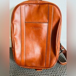 Brand new with rage Lucaldo leather backpack. My husband never used it.